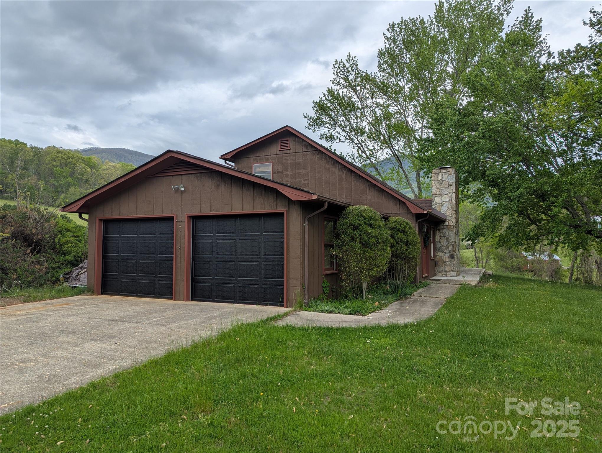 132 Hurd Road Canton, NC 28716 - Photo 17 of 46 a view of a house with a yard