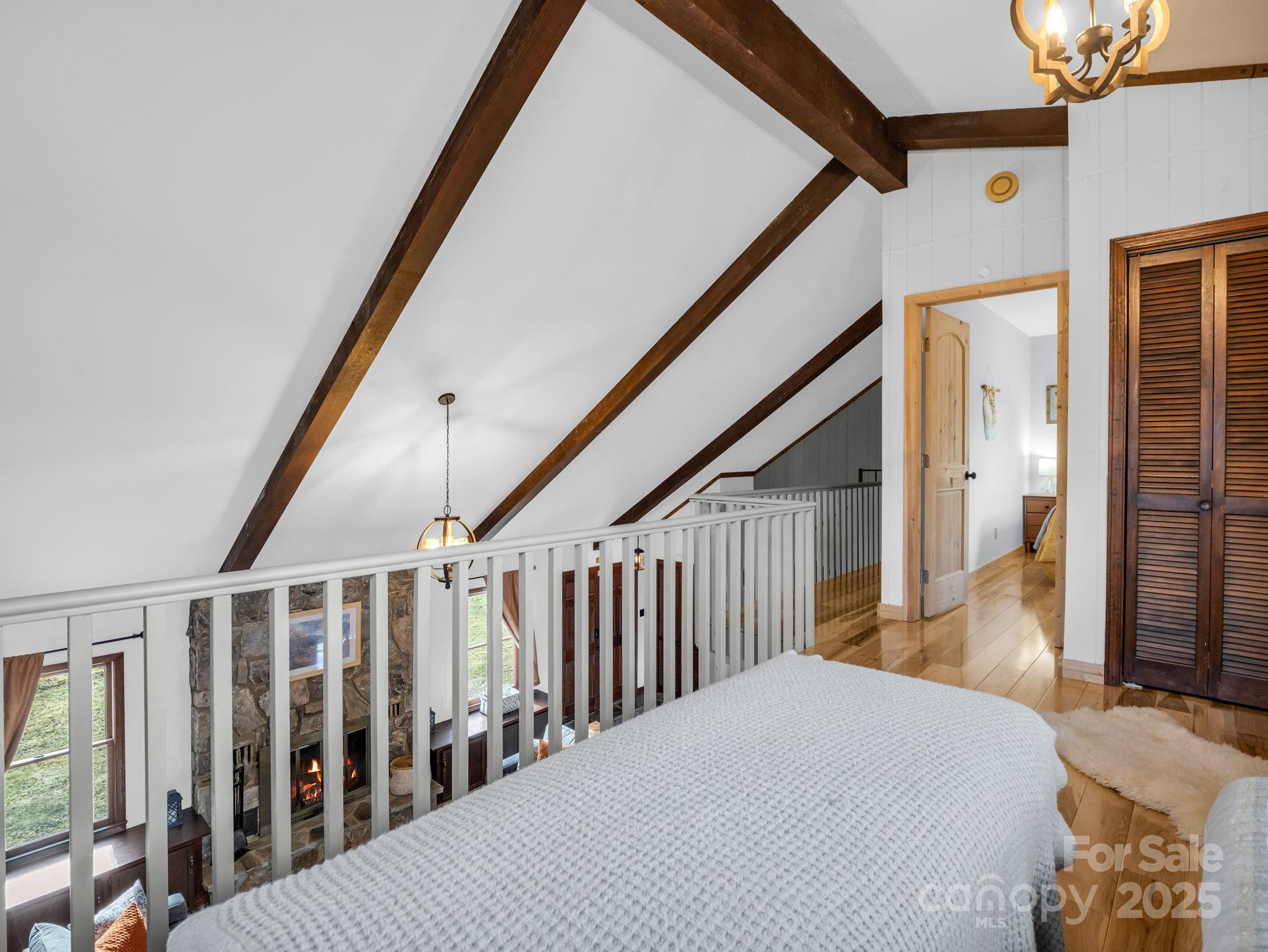 132 Hurd Road Canton, NC 28716 - Photo 36 of 46 a bedroom with a bed and a large window