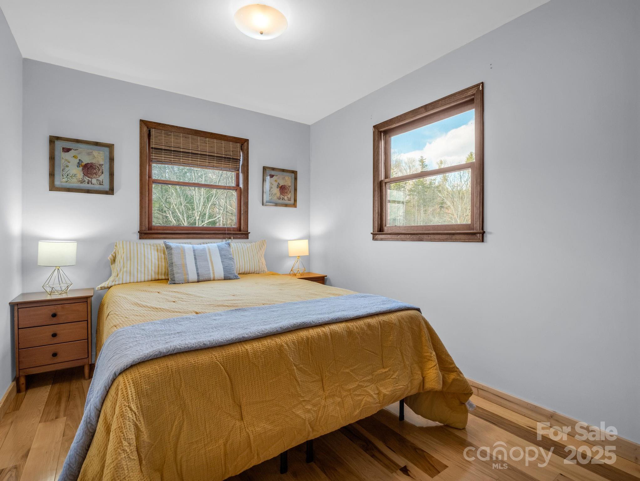 132 Hurd Road Canton, NC 28716 - Photo 37 of 46 a bedroom with a bed and a window