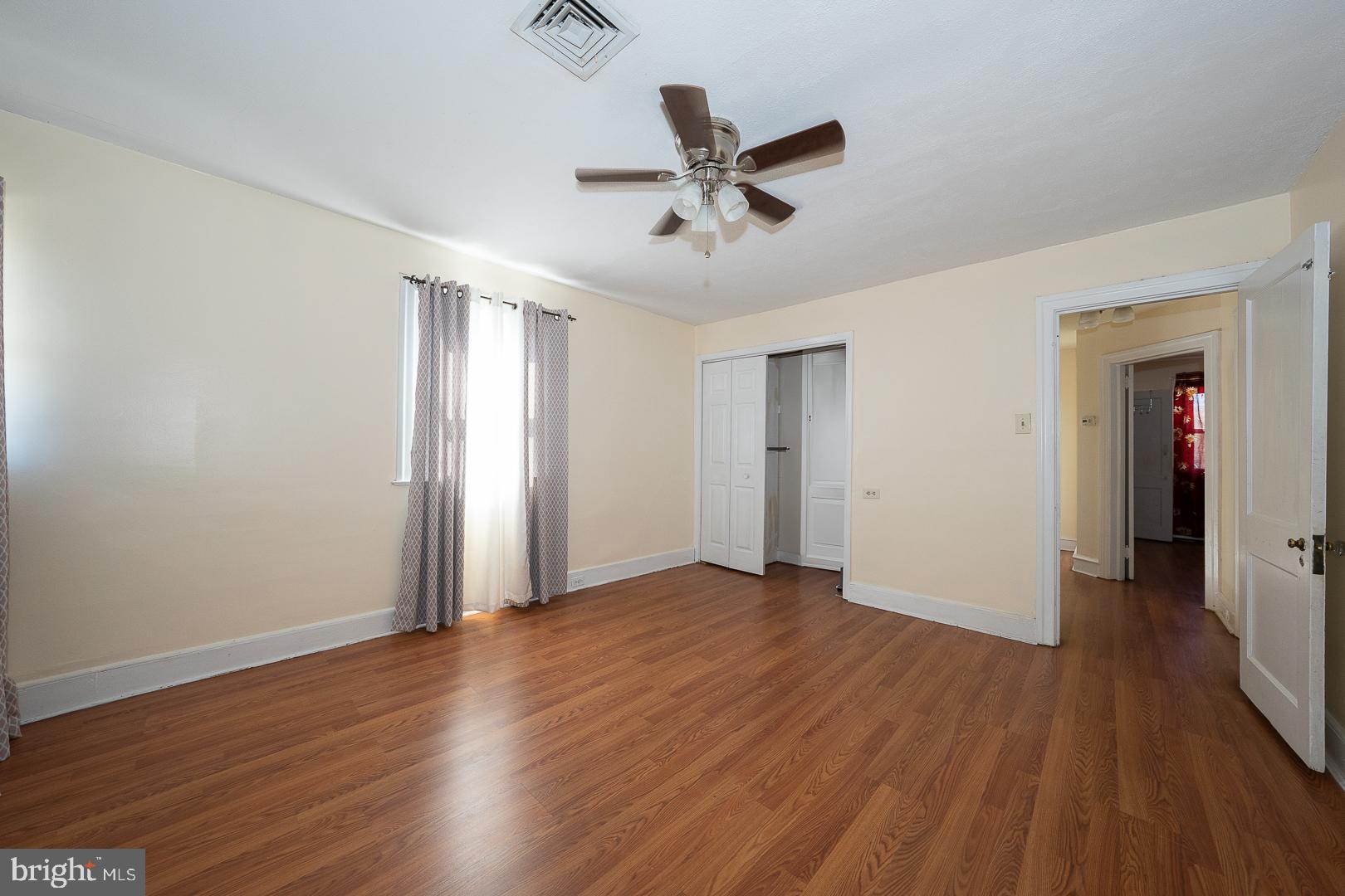136 Summit Avenue Upper Darby, PA 19082 - Photo 18 of 48 wooden floor in an empty room with a window