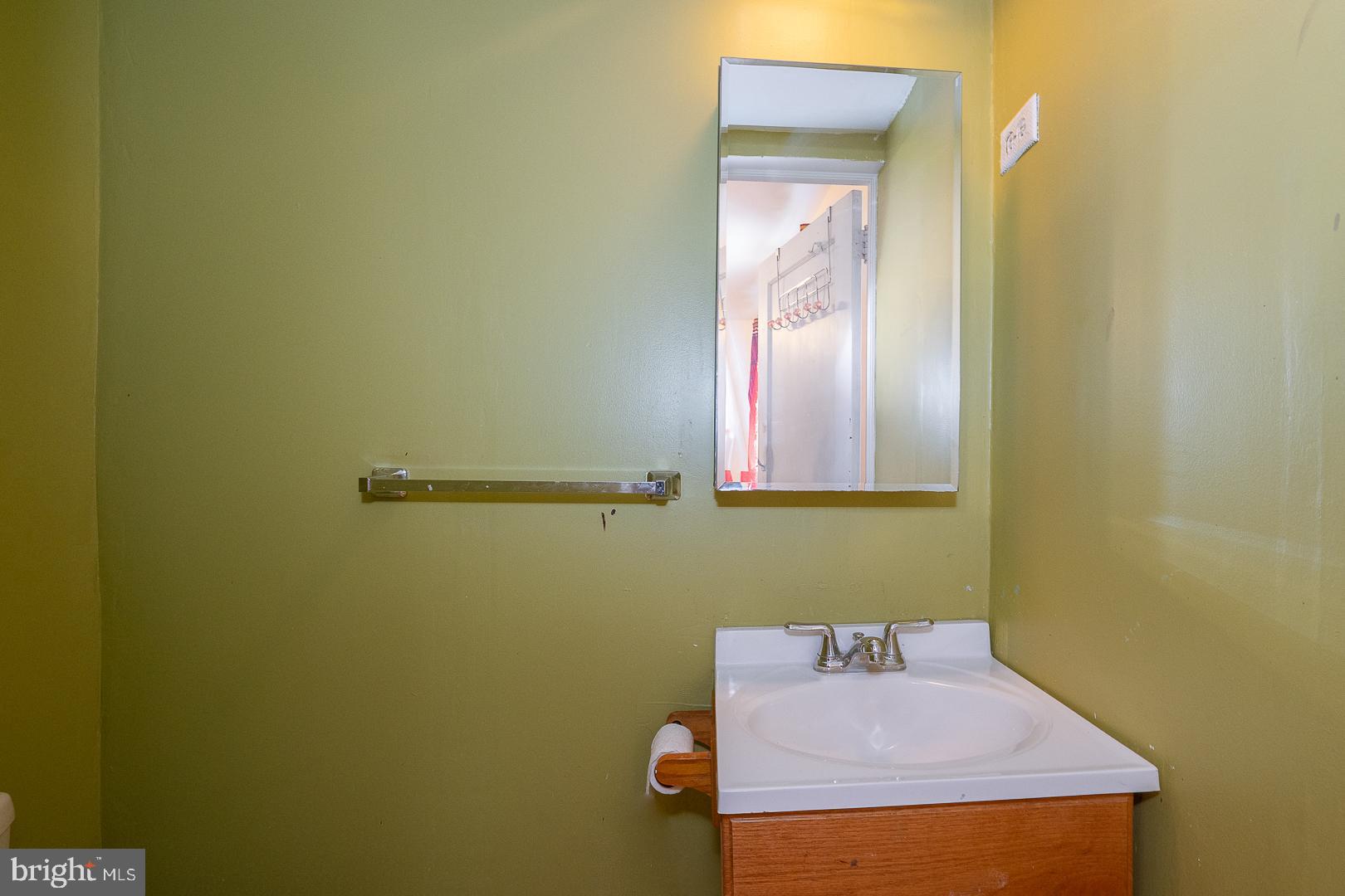 136 Summit Avenue Upper Darby, PA 19082 - Photo 23 of 48 a bathroom with a sink and a mirror