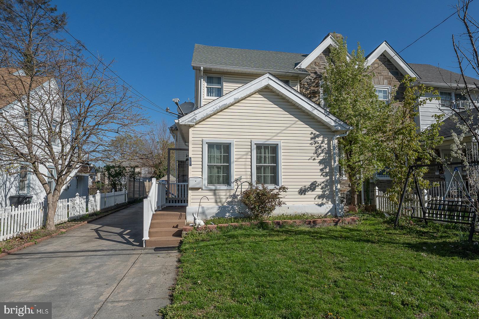 136 Summit Avenue Upper Darby, PA 19082 - Photo 48 of 48 a front view of house with yard and green space