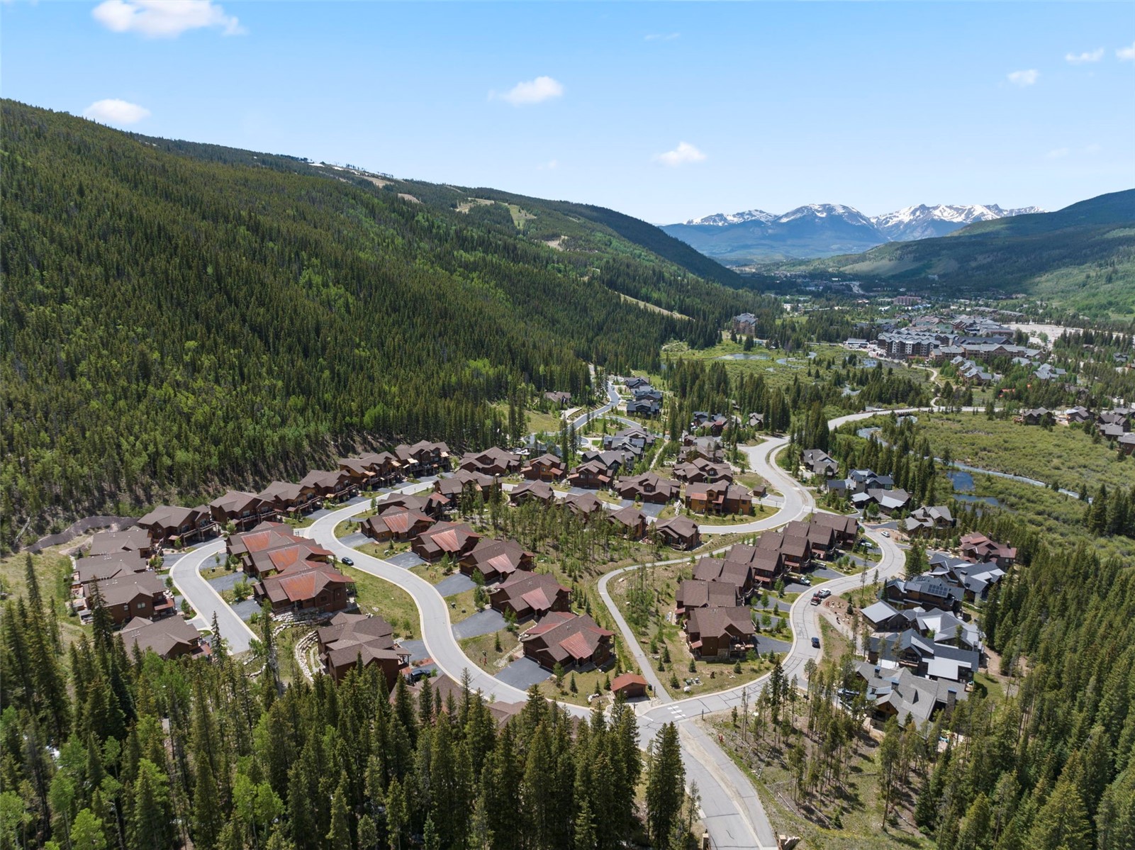 799 Independence Road, Unit 799 Keystone, CO 80435 - Photo 27 of 44 Aerial overview of property's location with a mountain backdrop and nearby suburban area