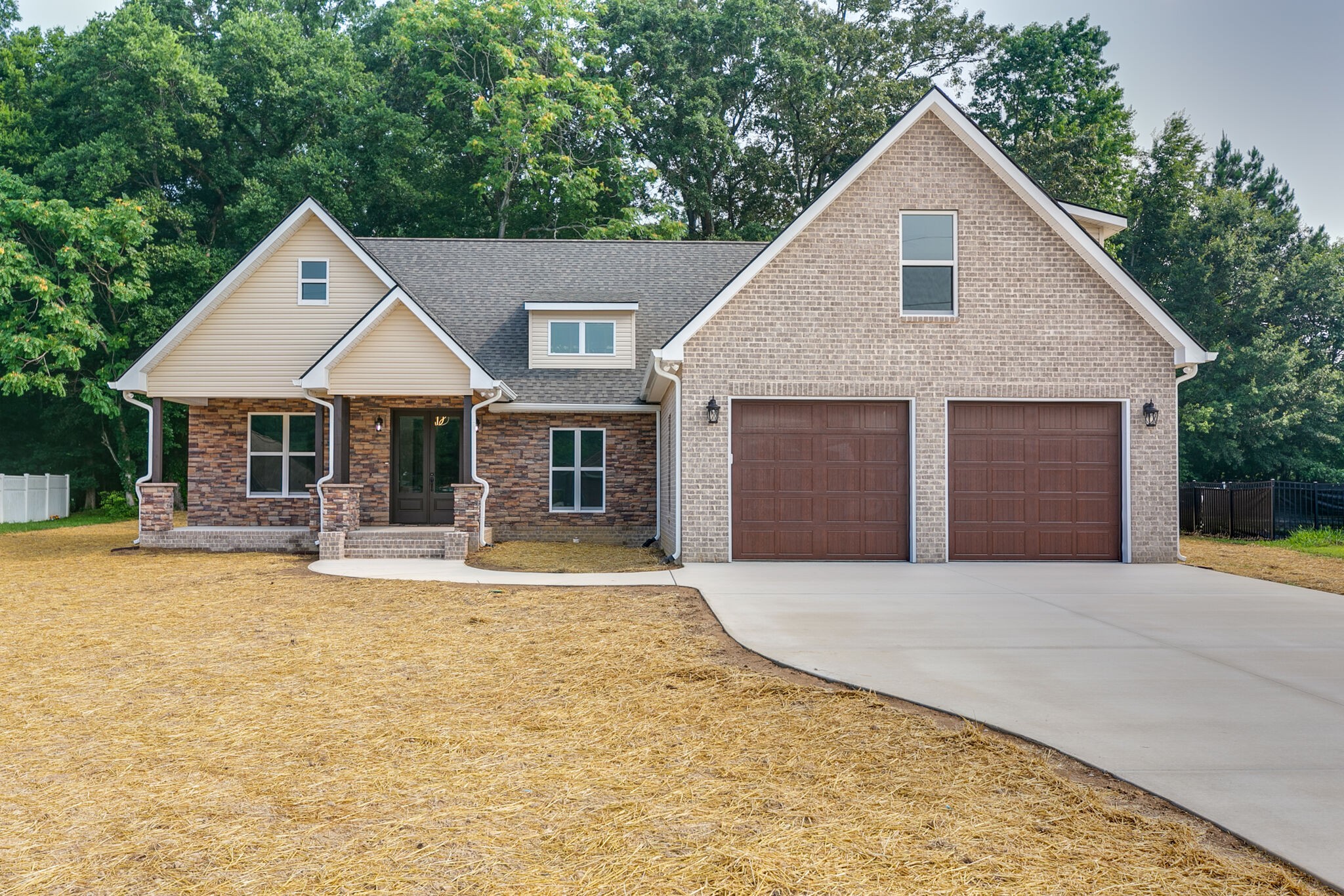 a front view of house with yard outdoor seating and yard