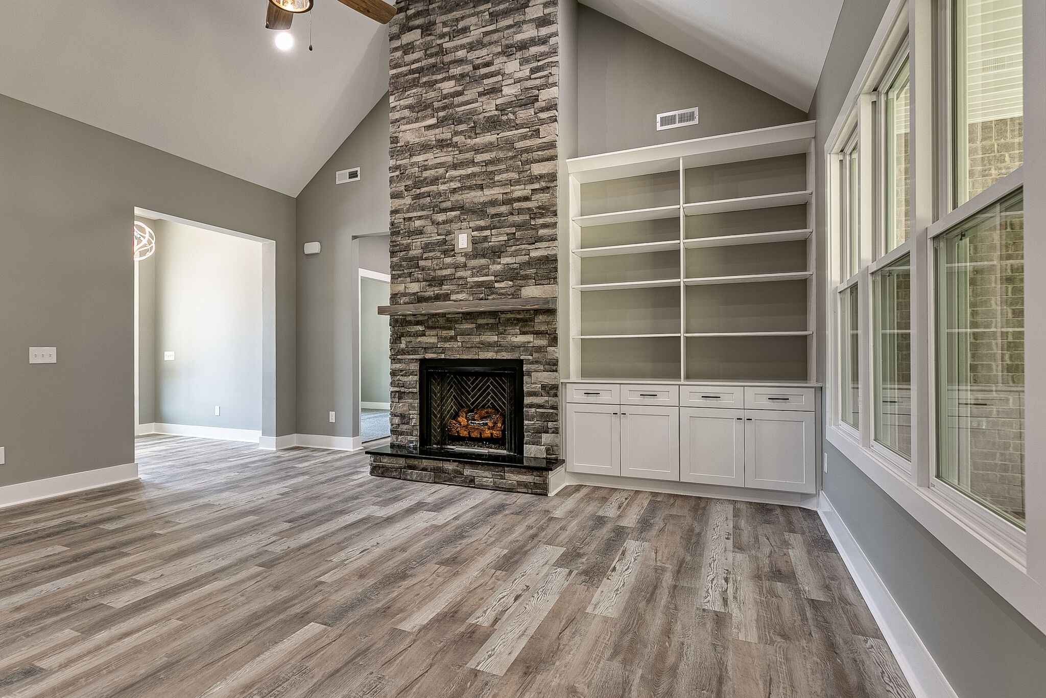 85 Post Road Manchester, TN 37355 - Photo 11 of 48 a view of an empty room with a fireplace and a window