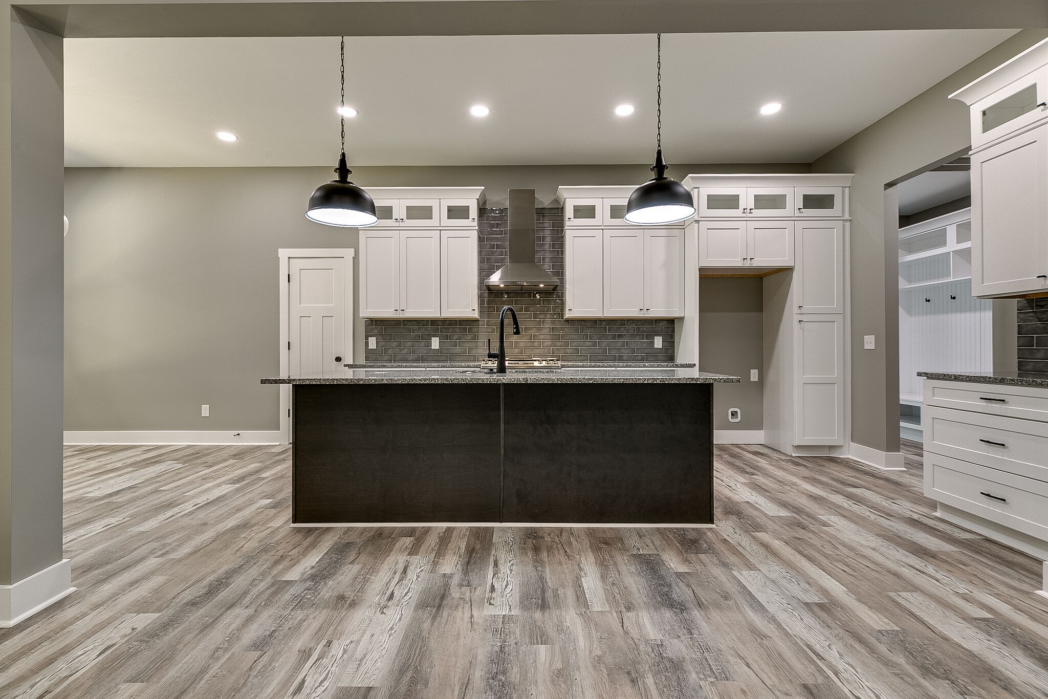 85 Post Road Manchester, TN 37355 - Photo 17 of 48 a kitchen with stainless steel appliances granite countertop a large counter top a stove and a refrigerator