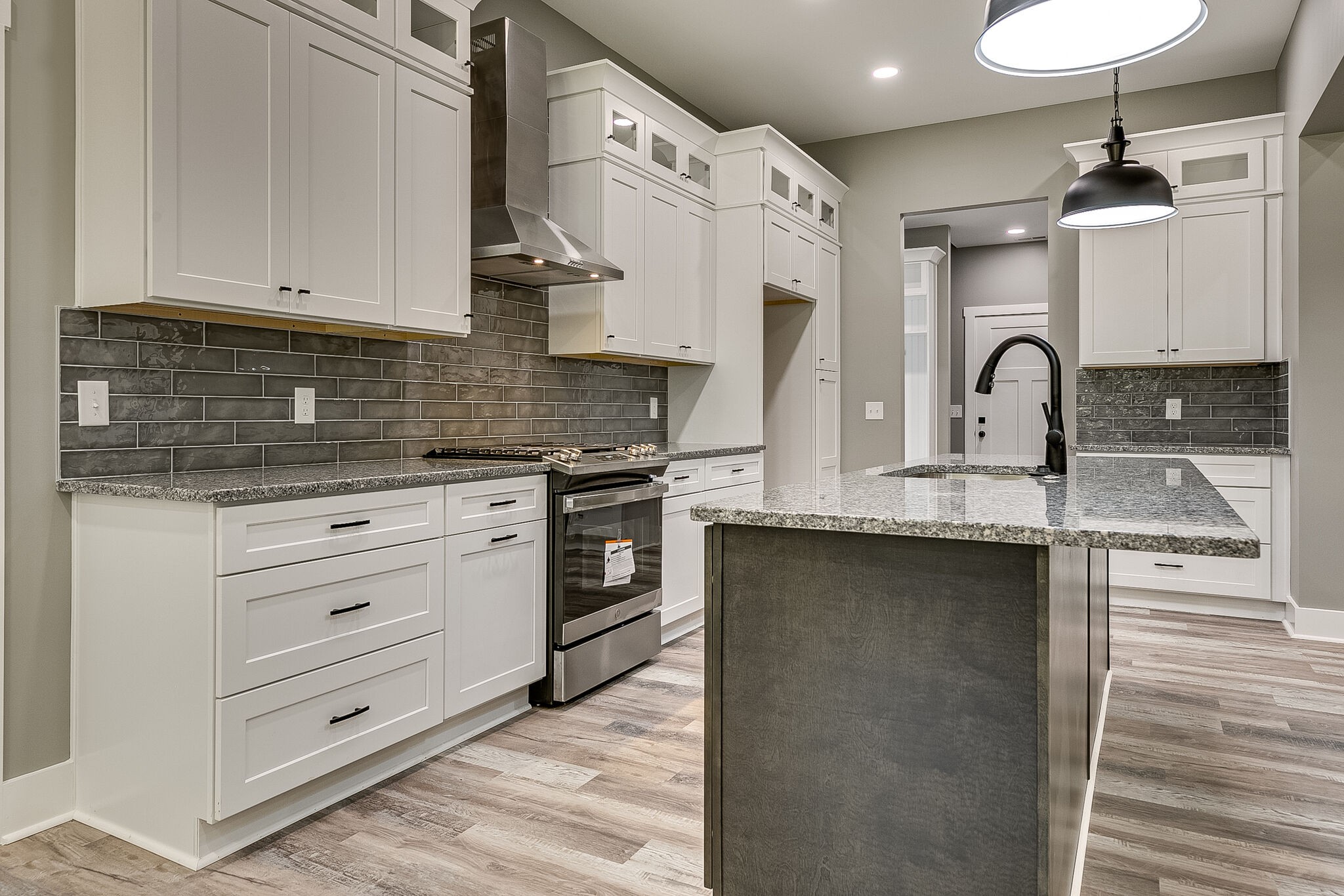 85 Post Road Manchester, TN 37355 - Photo 18 of 48 a kitchen with stainless steel appliances granite countertop a stove and a sink