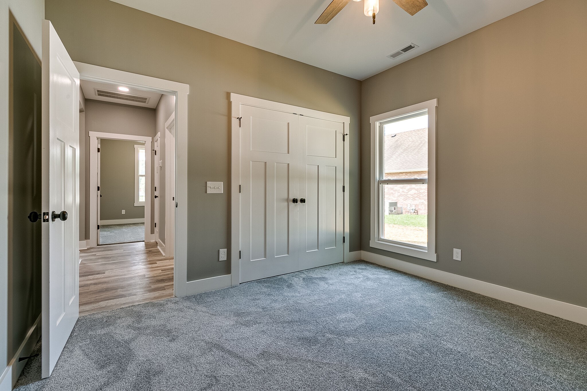 85 Post Road Manchester, TN 37355 - Photo 28 of 48 a view of a big room with windows and chandelier fan