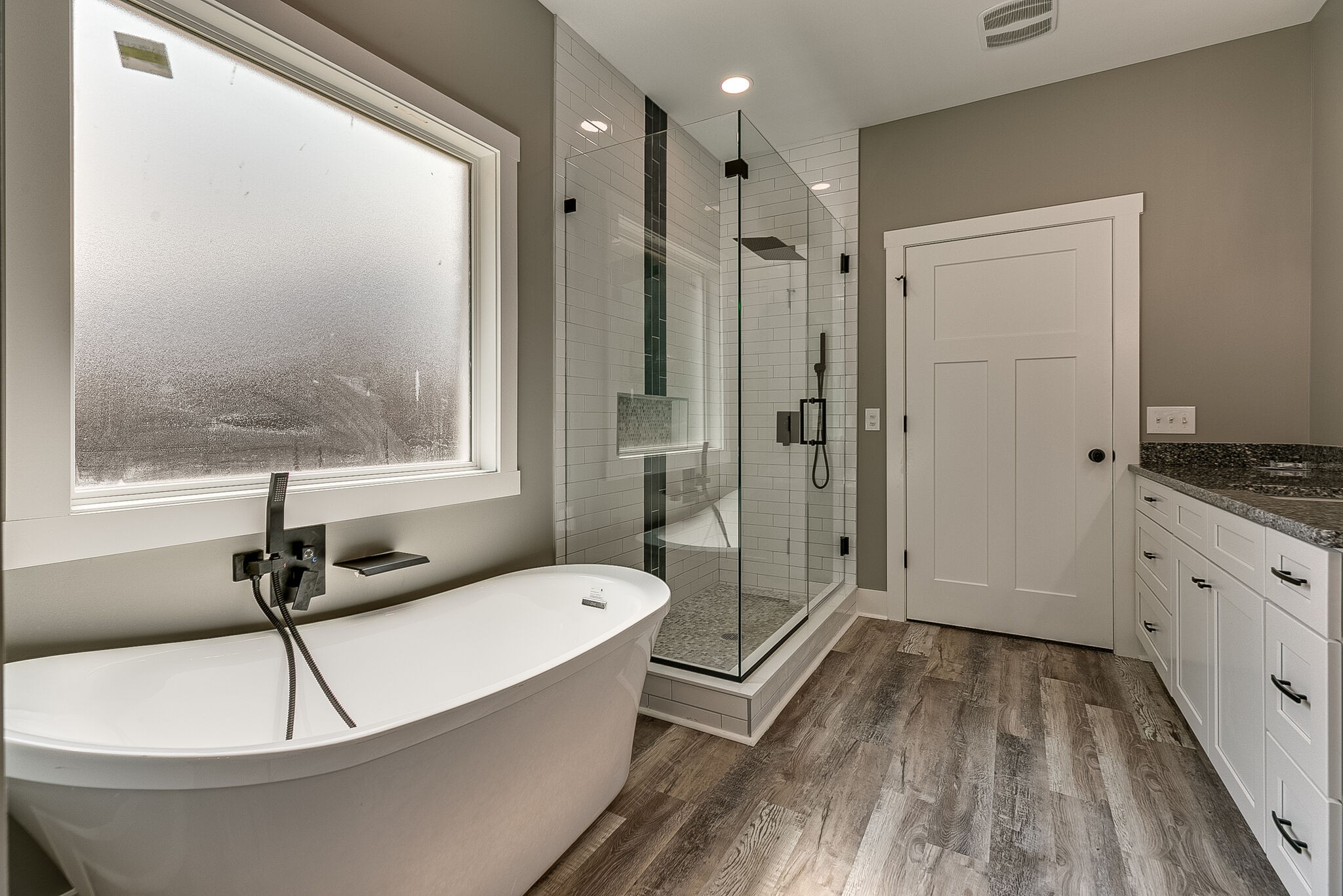 85 Post Road Manchester, TN 37355 - Photo 38 of 48 a bathroom with a bathtub a toilet and a shower