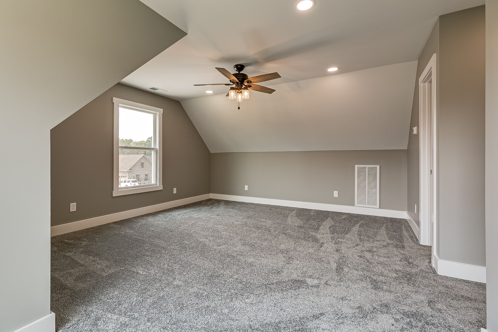85 Post Road Manchester, TN 37355 - Photo 44 of 48 an empty room with windows and ceiling fan