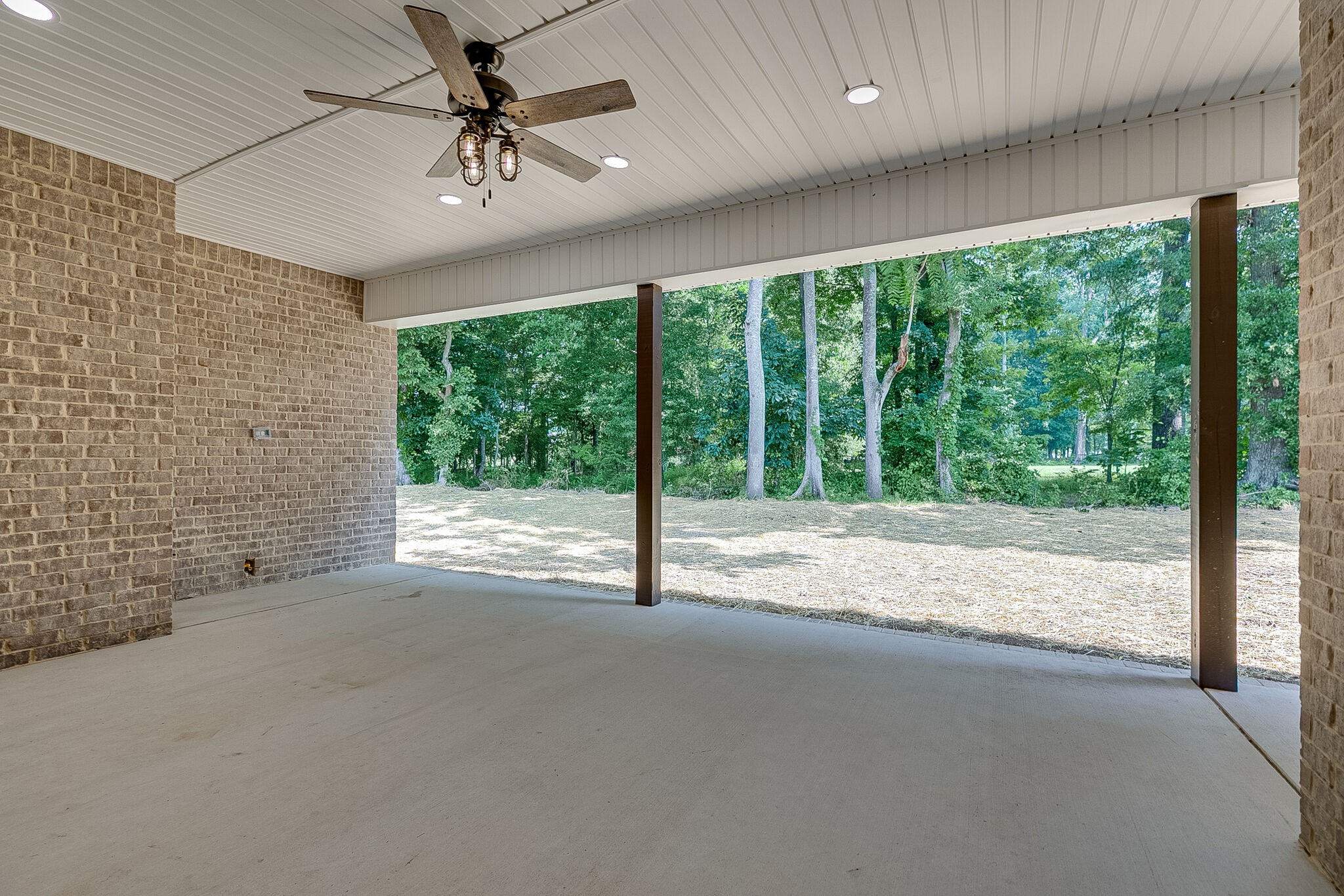 85 Post Road Manchester, TN 37355 - Photo 45 of 48 a view of a room with a ceiling fan and a porch