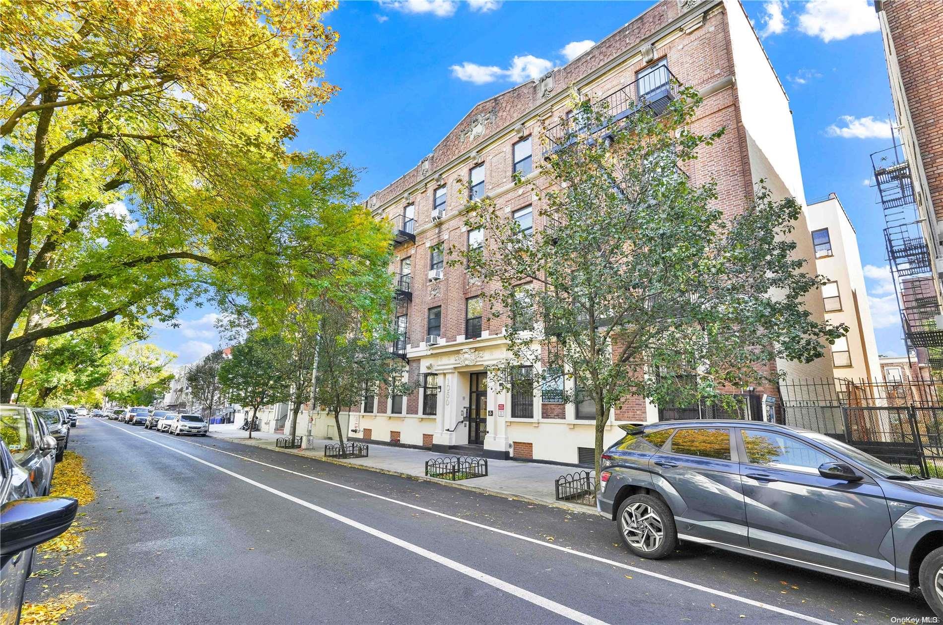 1050 Hancock Street, Unit 3E Brooklyn, NY 11221 - Photo 1 of 1 a view of a cars park in front of a building