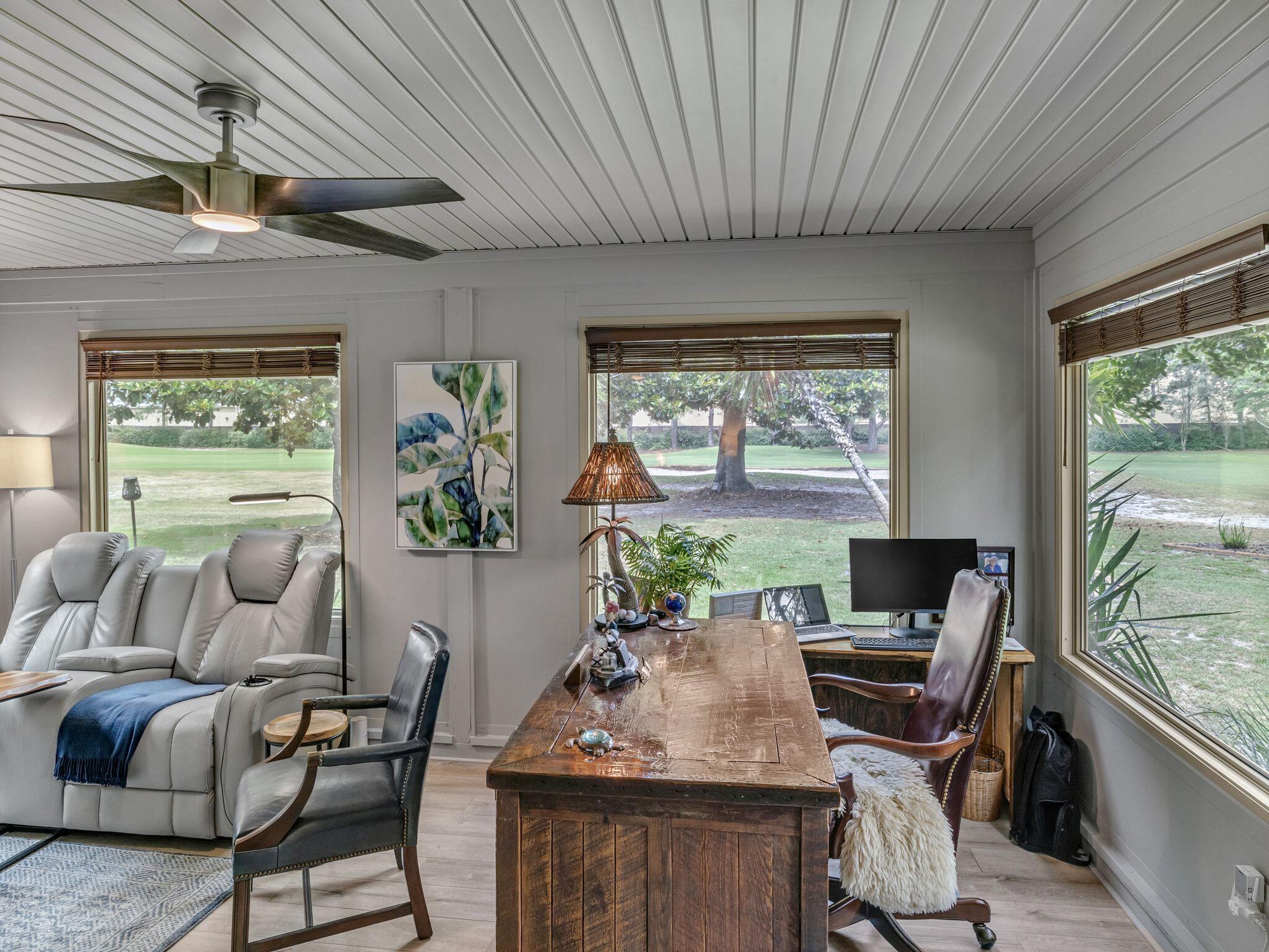 370 Golfview Drive Miramar Beach, FL 32550 - Photo 109 of 148 a living room with furniture and a flat screen tv