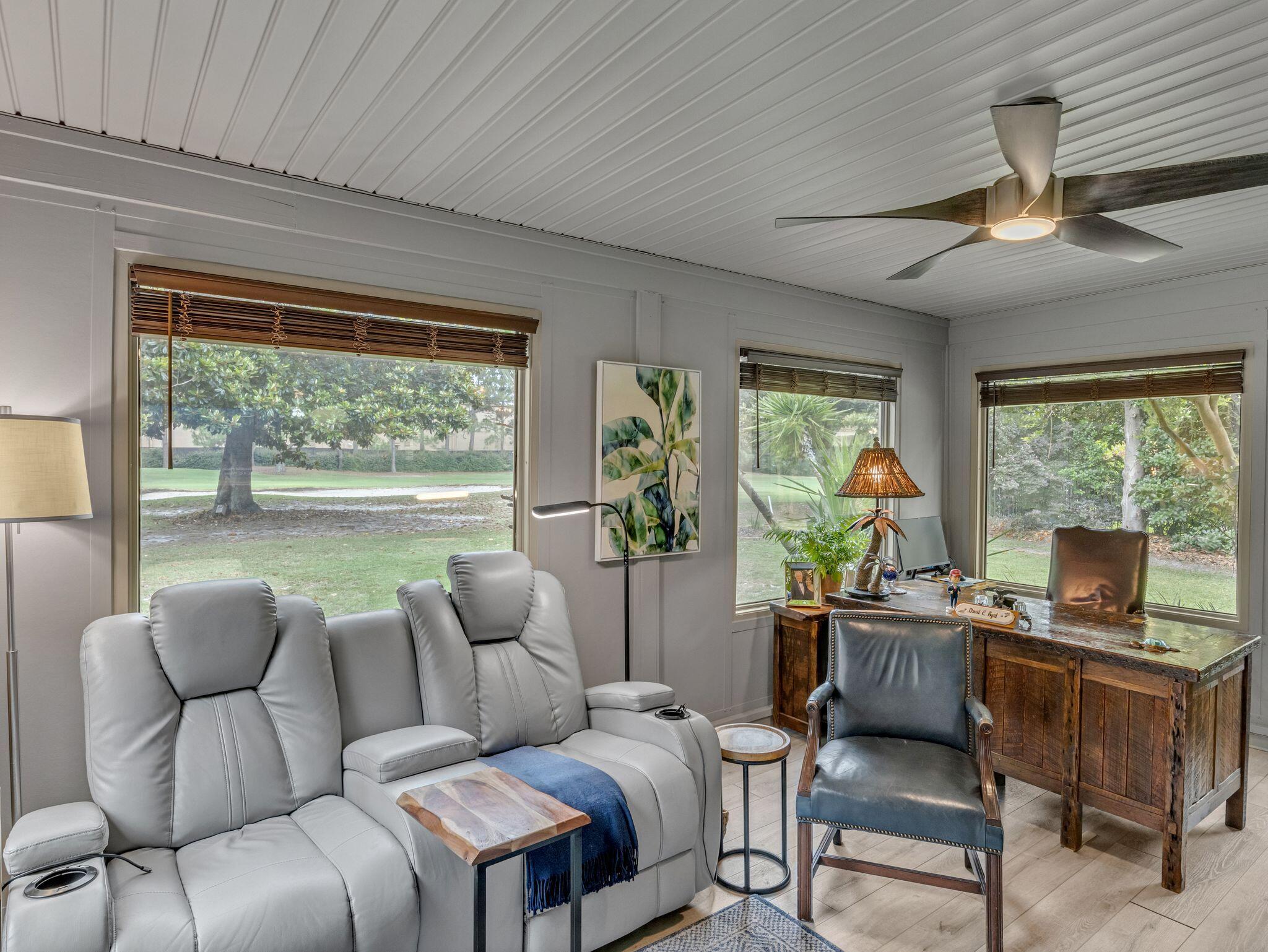 370 Golfview Drive Miramar Beach, FL 32550 - Photo 110 of 148 a living room with furniture and a large window