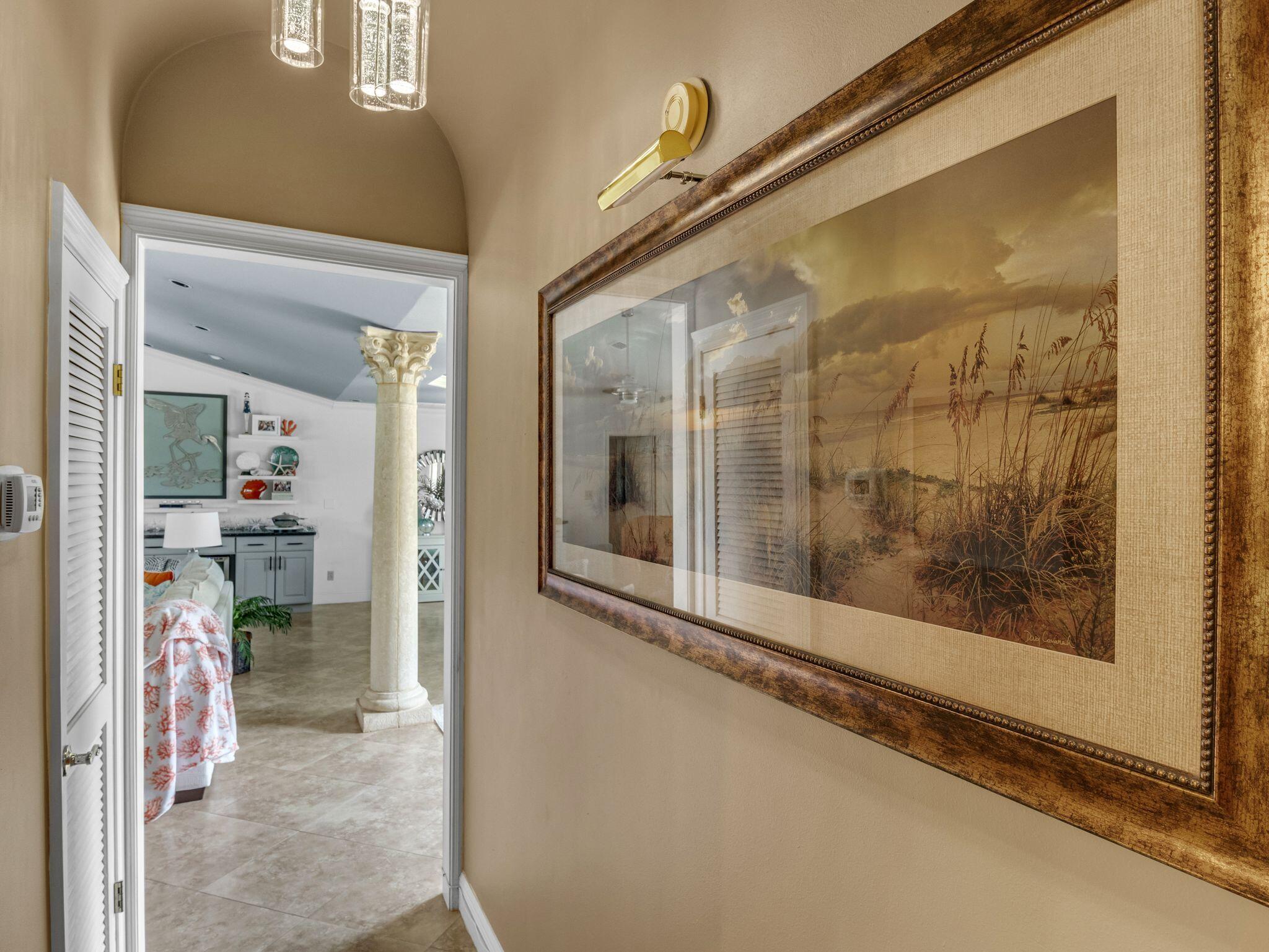 370 Golfview Drive Miramar Beach, FL 32550 - Photo 125 of 148 a view of a hallway with a glass door and a window