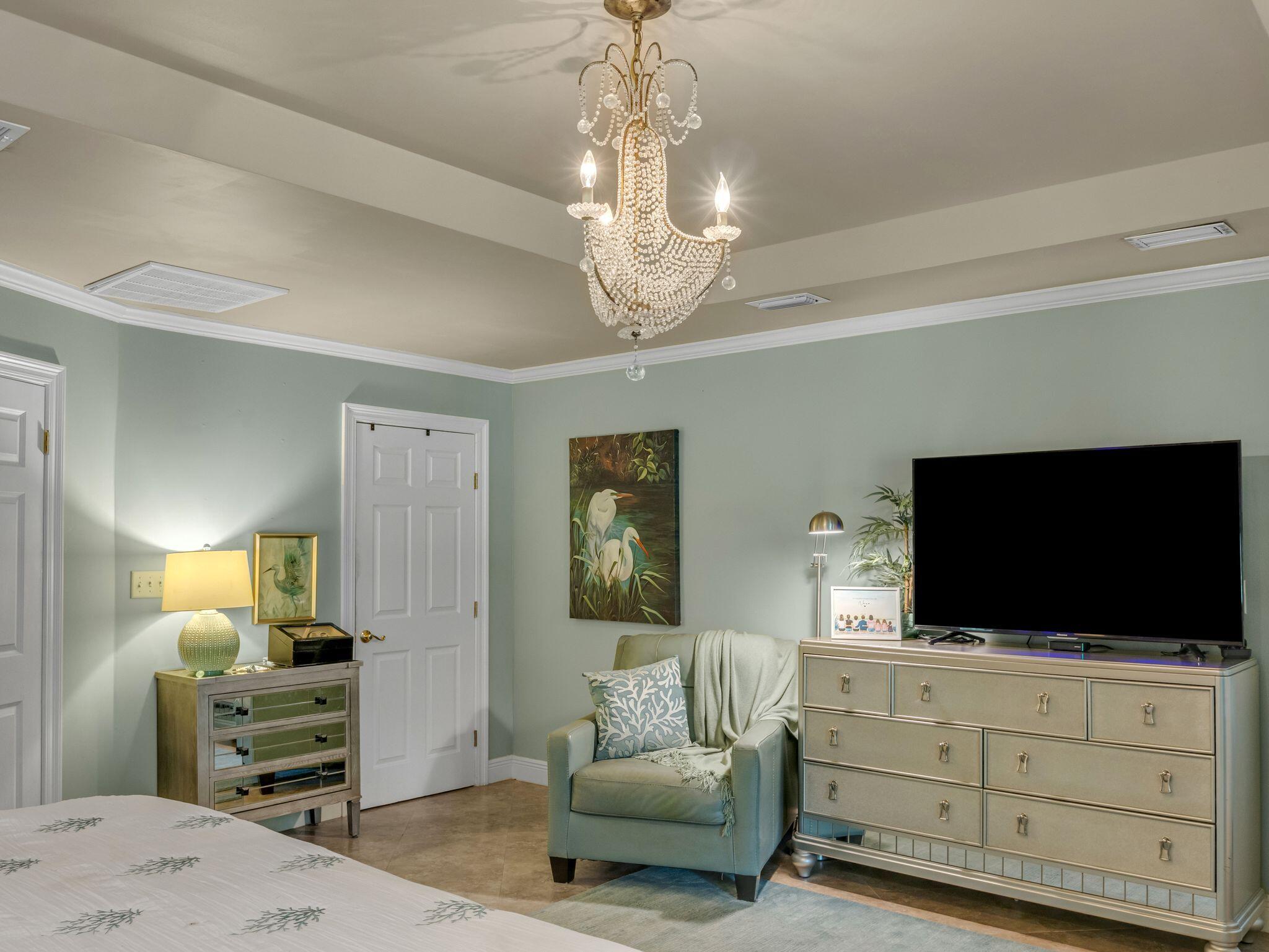 370 Golfview Drive Miramar Beach, FL 32550 - Photo 28 of 148 a living room with furniture and a flat screen tv