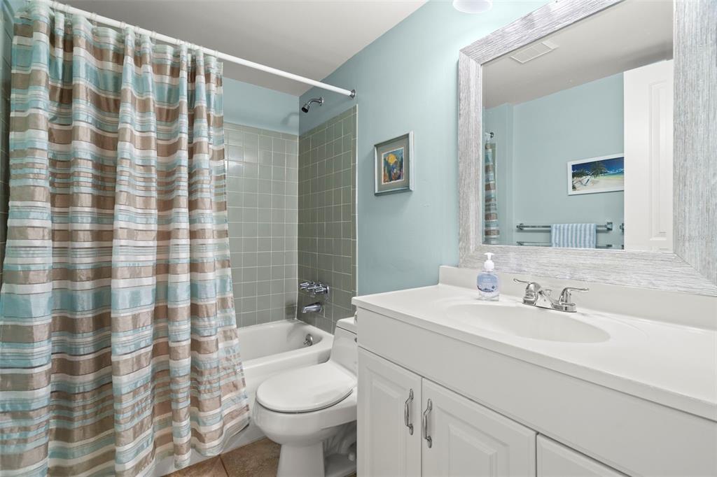 7701 Starkey Road, Unit 601 Seminole, FL 33777 - Photo 15 of 28 a bathroom with a sink and mirror