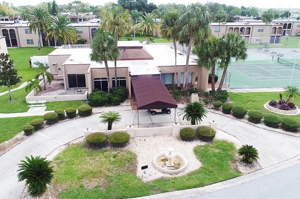 7701 Starkey Road, Unit 601 Seminole, FL 33777 - Photo 20 of 28 a view of a house with backyard and sitting area