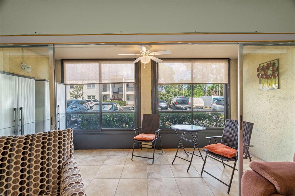 7701 Starkey Road, Unit 601 Seminole, FL 33777 - Photo 3 of 28 a outdoor living space with furniture and a potted plant