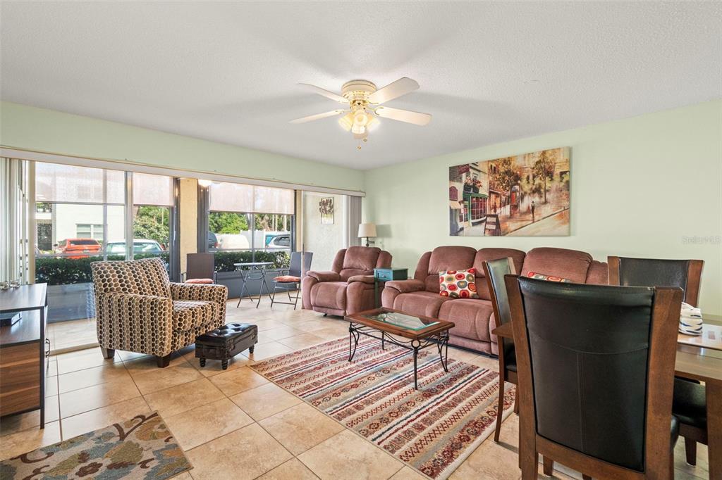 7701 Starkey Road, Unit 601 Seminole, FL 33777 - Photo 5 of 28 a living room with furniture and a window