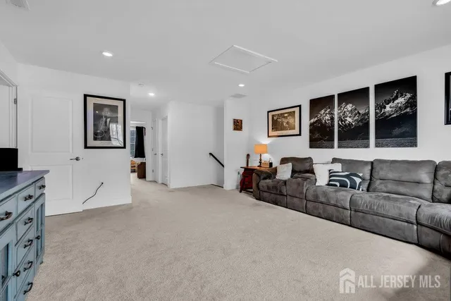 a living room with furniture and window