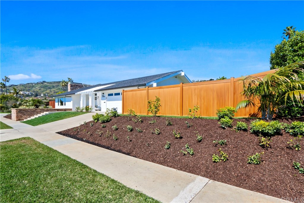 32682 7 Seas Drive Dana Point, CA 92629 - Photo 13 of 32 Front exterior showing off newly updated landscaping & exteriors. A perfect beach house.