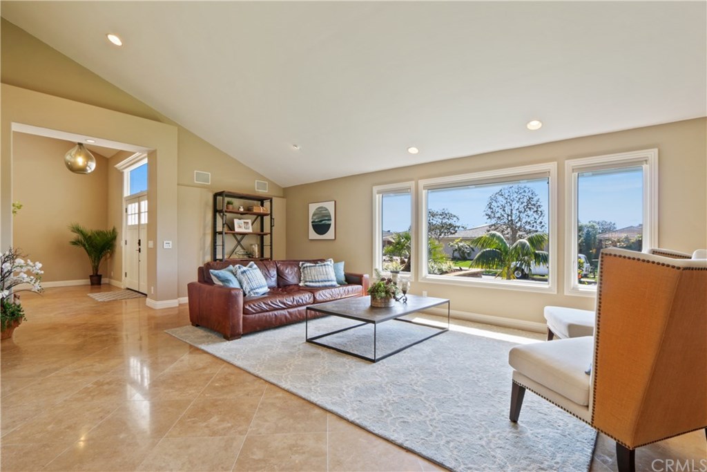 32682 7 Seas Drive Dana Point, CA 92629 - Photo 3 of 32 Luxurious imported stone flooring, high ceilings, large picture windows, and a formal entryway adds to beauty of this living area.