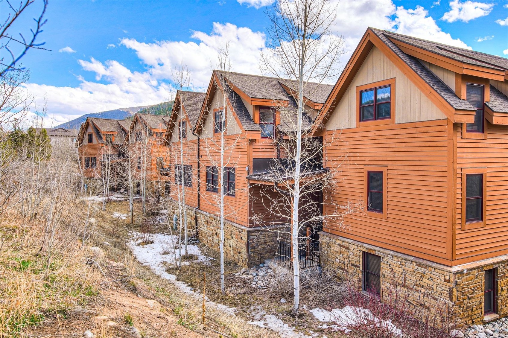 71 Antlers Gulch Road, Unit 303 Keystone, CO 80435 - Photo 32 of 35 a view of a house with a yard