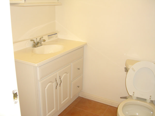 17 Devonshire Boulevard San Carlos, CA 94070 - Photo 18 of 25 a bathroom with a sink and a mirror