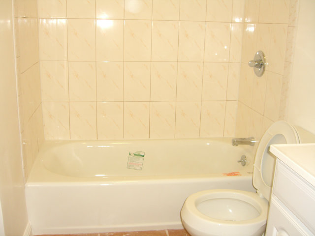 17 Devonshire Boulevard San Carlos, CA 94070 - Photo 19 of 25 a bathroom with a toilet and a bathtub