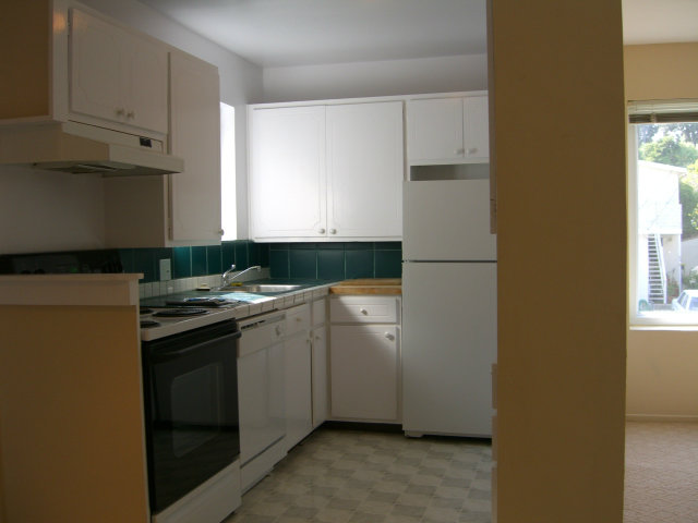 17 Devonshire Boulevard San Carlos, CA 94070 - Photo 25 of 25 a kitchen with a refrigerator and a window