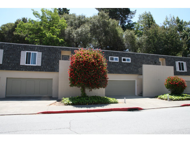 17 Devonshire Boulevard San Carlos, CA 94070 - Photo 4 of 25 a front view of a house with a yard and garage
