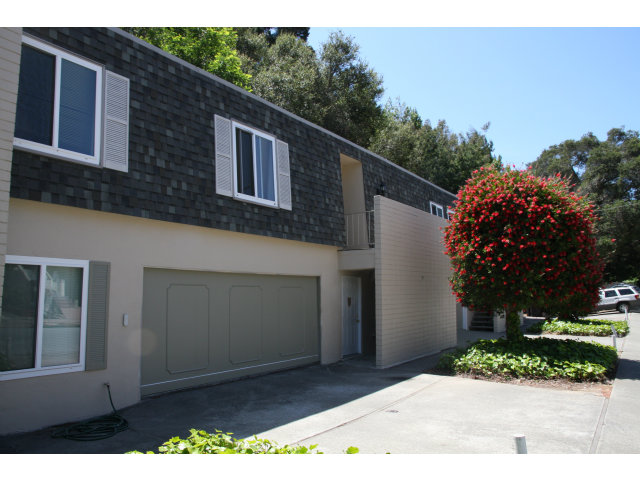 17 Devonshire Boulevard San Carlos, CA 94070 - Photo 5 of 25 a front view of a house with a yard and garage