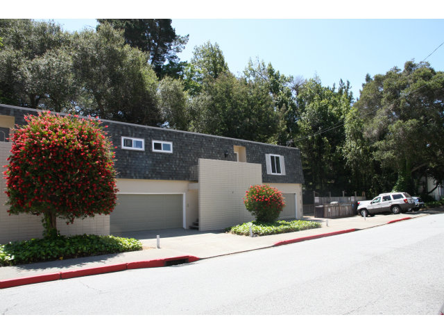 17 Devonshire Boulevard San Carlos, CA 94070 - Photo 6 of 25 a front view of a house with a yard and garage