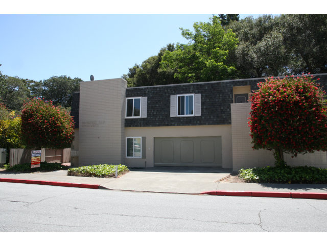 17 Devonshire Boulevard San Carlos, CA 94070 - Photo 7 of 25 a front view of a house with a yard and garage