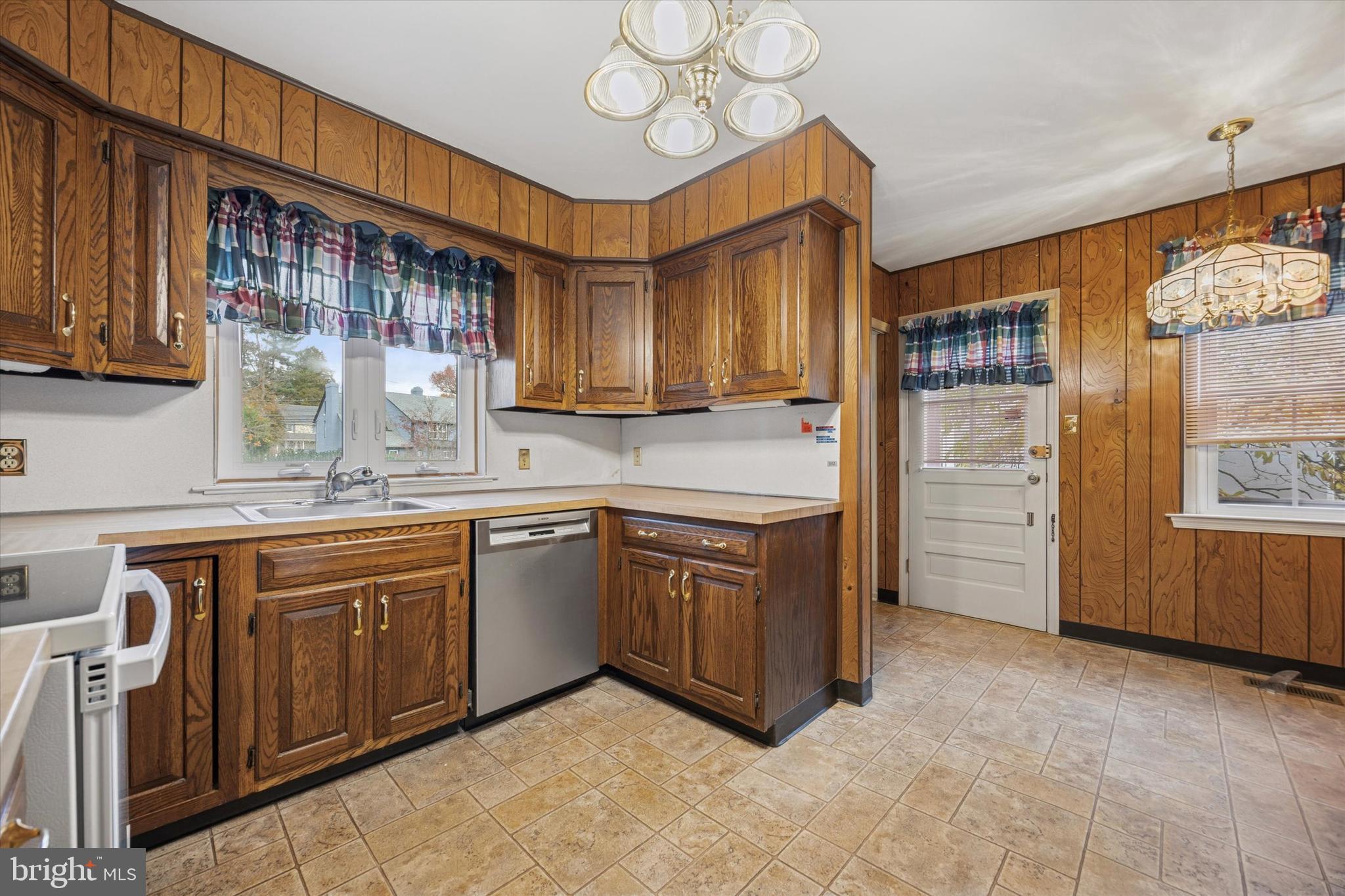 9 Hansen Court Narberth, PA 19072 - Photo 5 of 29 a kitchen with cabinets and window