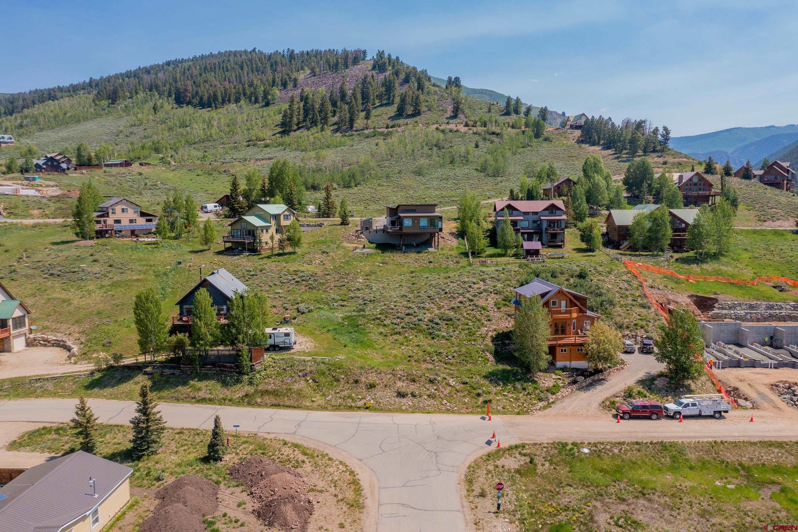 an aerial view of a house with outdoor space