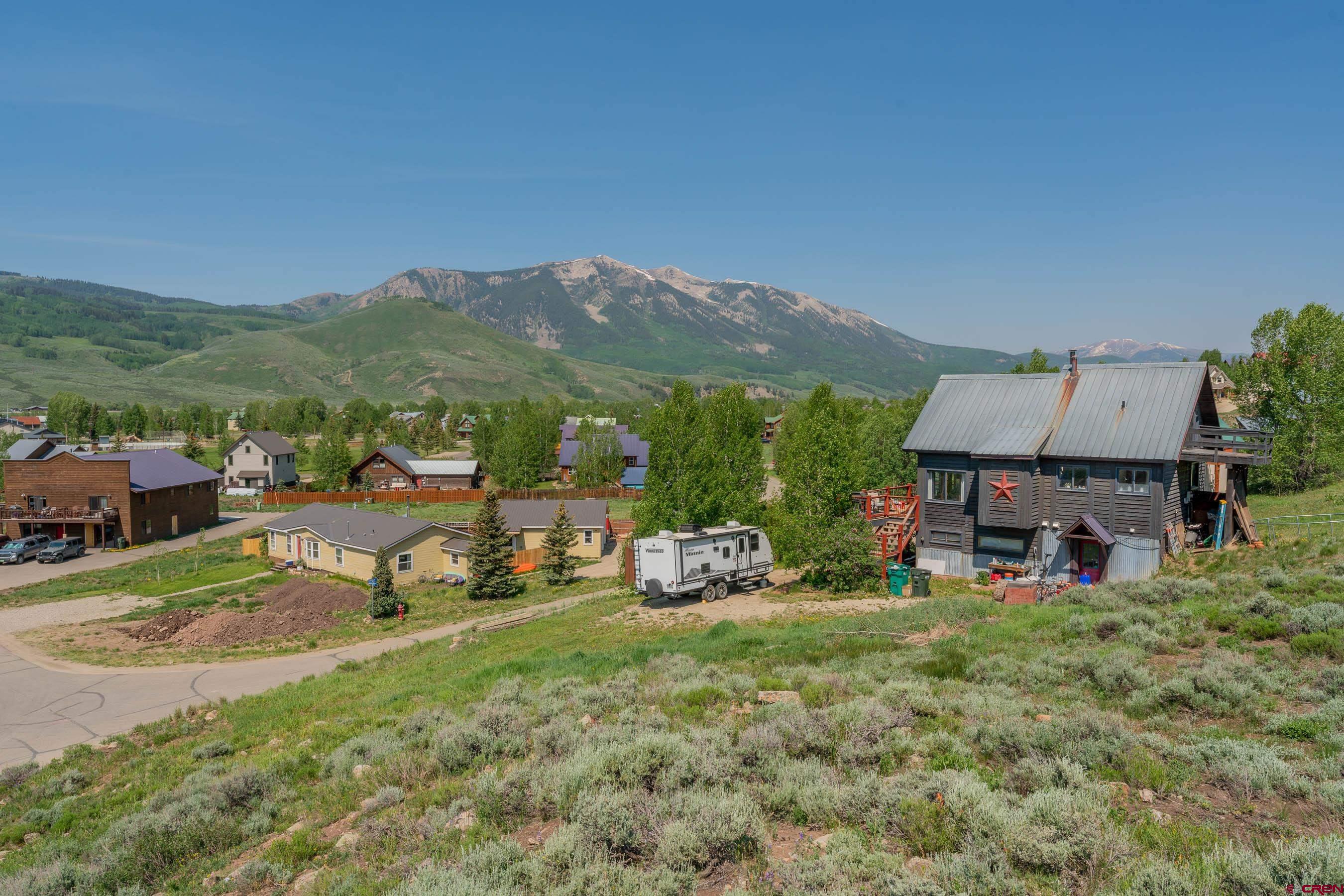 141 Haverly Street Crested Butte, CO 81224 - Photo 14 of 25 a view of a garden with houses