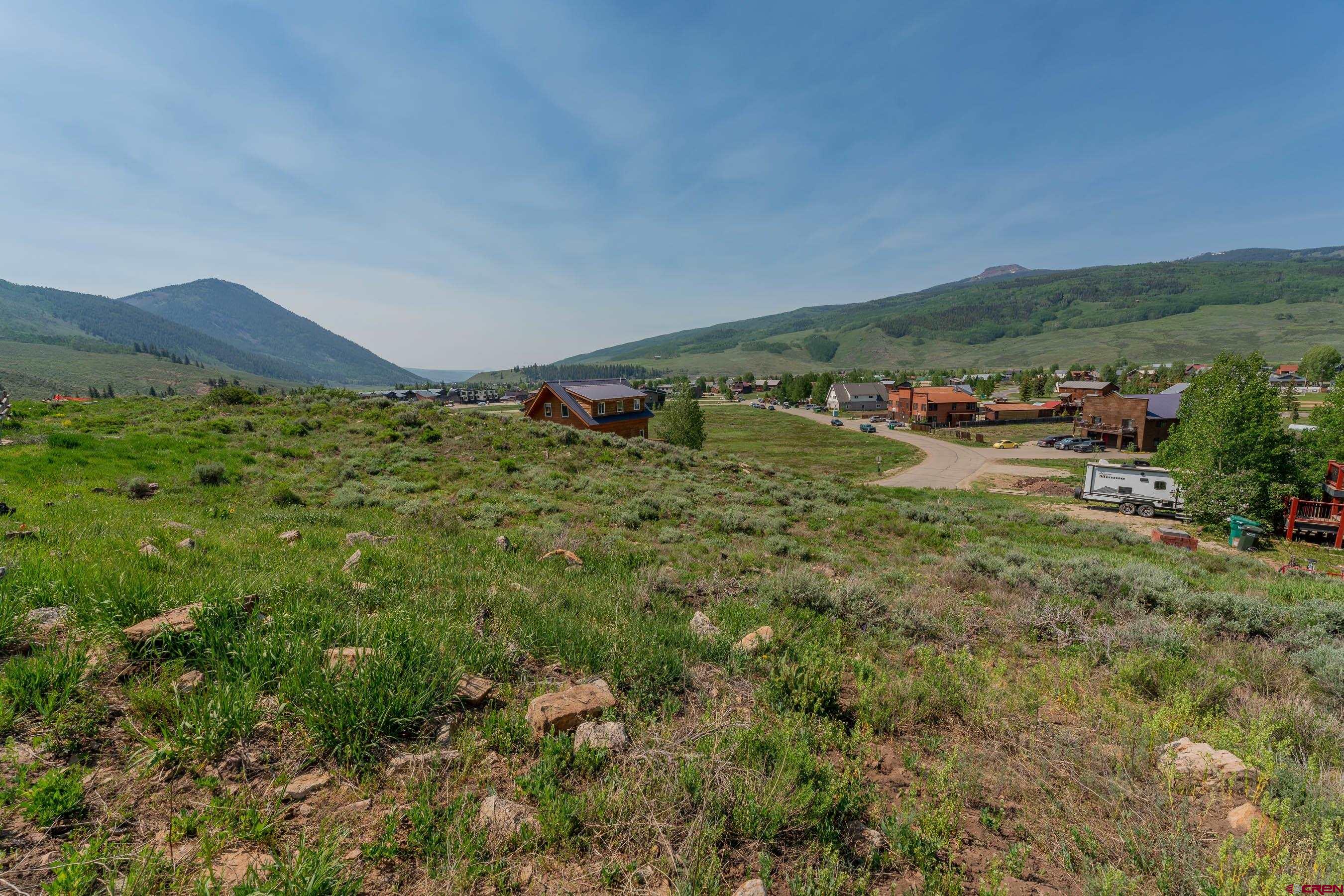 141 Haverly Street Crested Butte, CO 81224 - Photo 9 of 25 a view of a field with an ocean