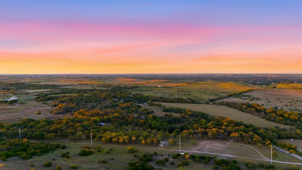2401 Bear Creek Road Aledo, TX 76008 - Photo 33 of 37 Aerial view of property and surrounding area featuring rural landscape