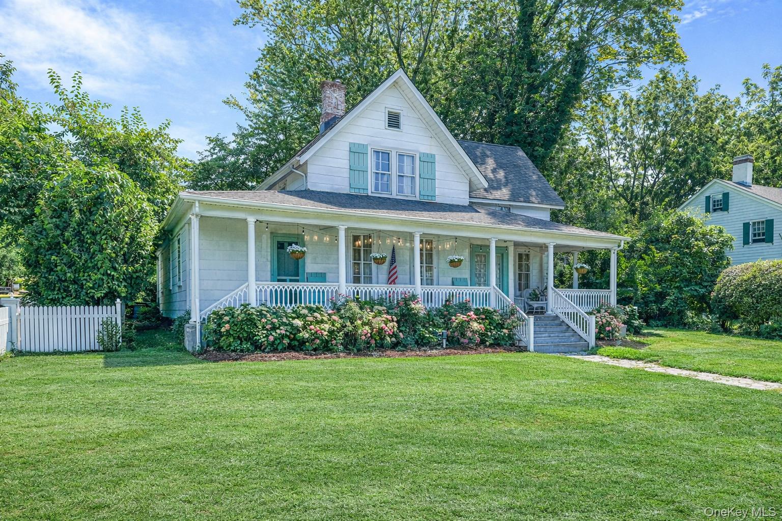 45 Shore Road East Setauket, NY 11733 - Photo 3 of 27 front view of a house with a yard