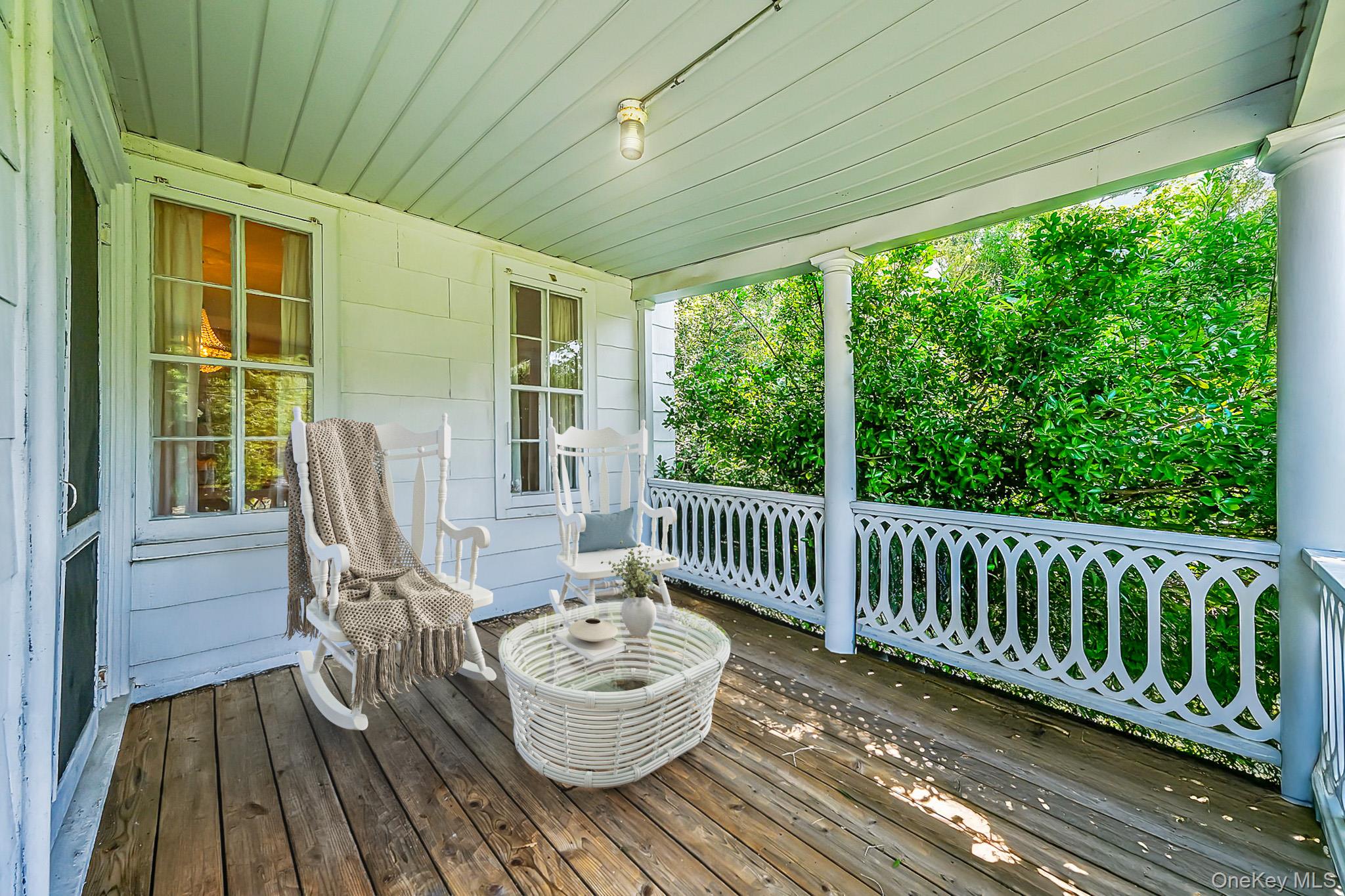 45 Shore Road East Setauket, NY 11733 - Photo 6 of 27 a view of balcony with furniture and wooden deck