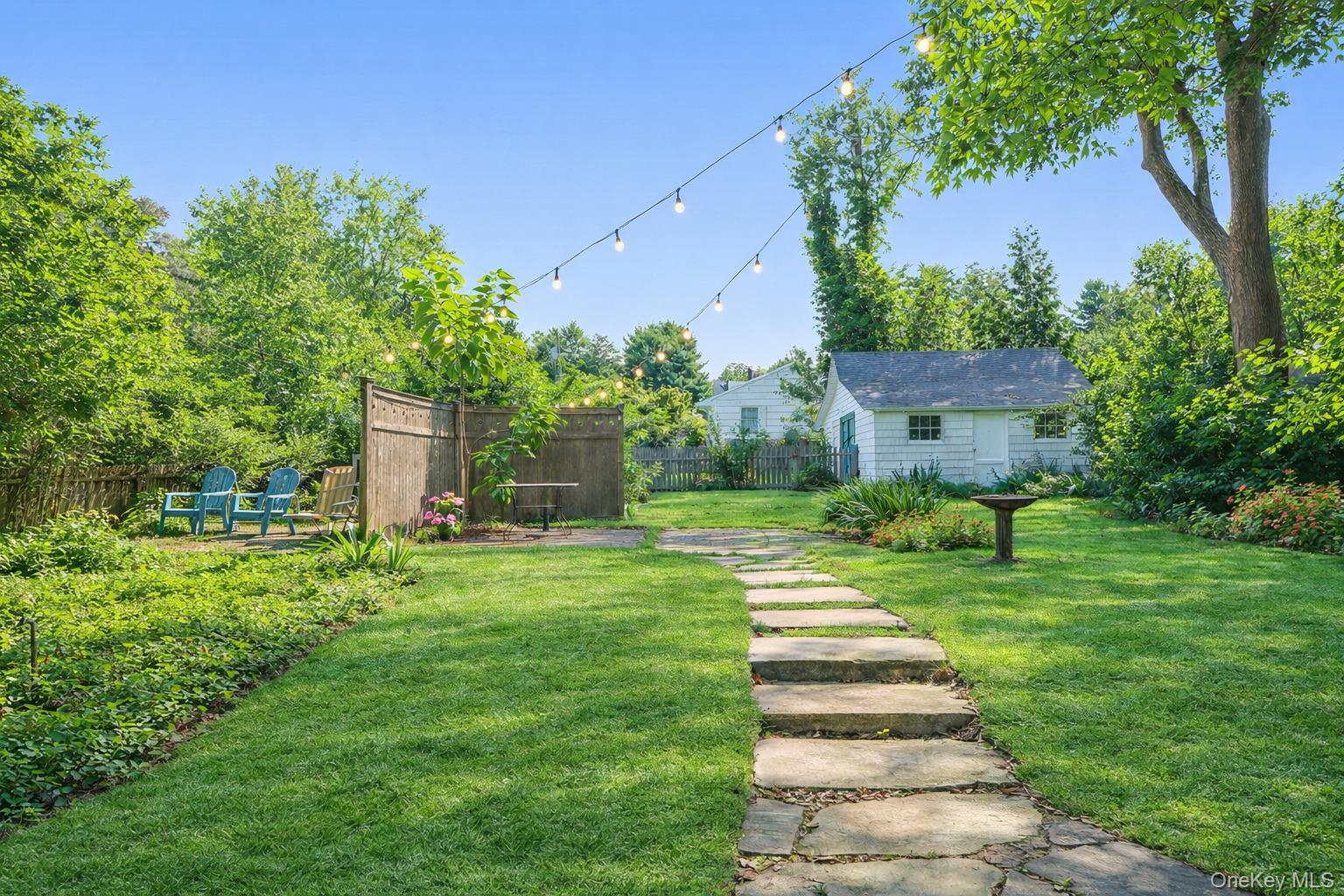 45 Shore Road East Setauket, NY 11733 - Photo 7 of 27 a front view of a house with a yard