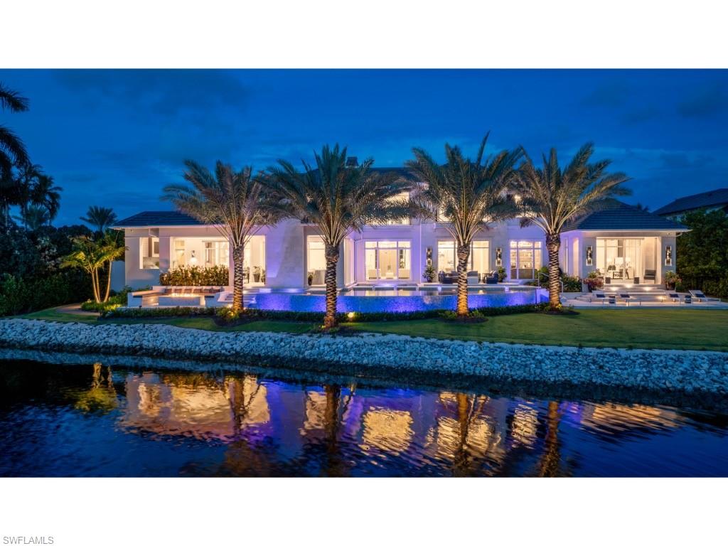 3200 Gin Lane Naples, FL 34102 - Photo 20 of 20 a view of house with outdoor space and seating area