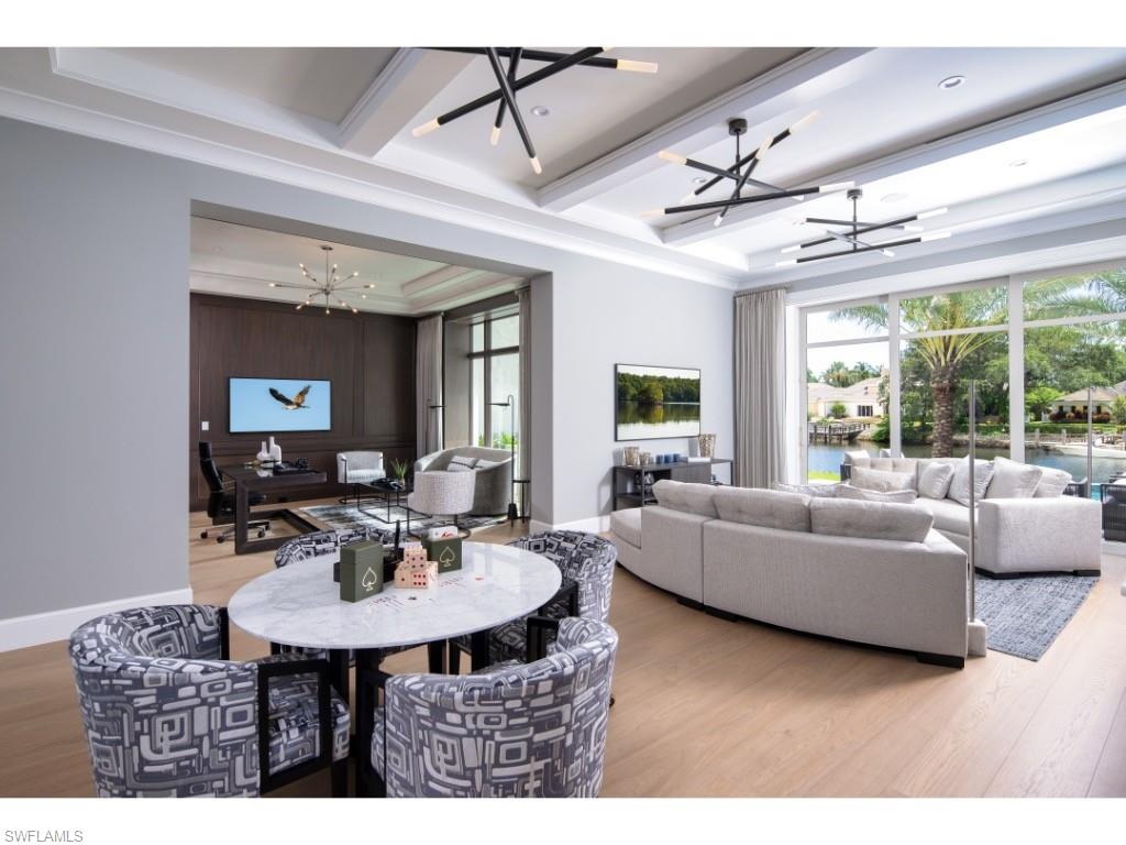 3200 Gin Lane Naples, FL 34102 - Photo 4 of 20 a view of a livingroom with furniture and window