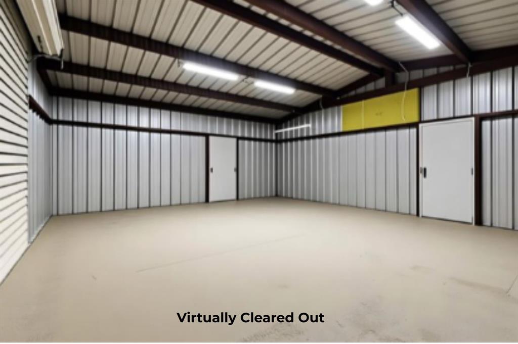 252 Meadow Lake Estates Road Denison, TX 75021 - Photo 6 of 37 Virtually cleared out- Large electric shop with large amount of space for your next project, toys or vehicles