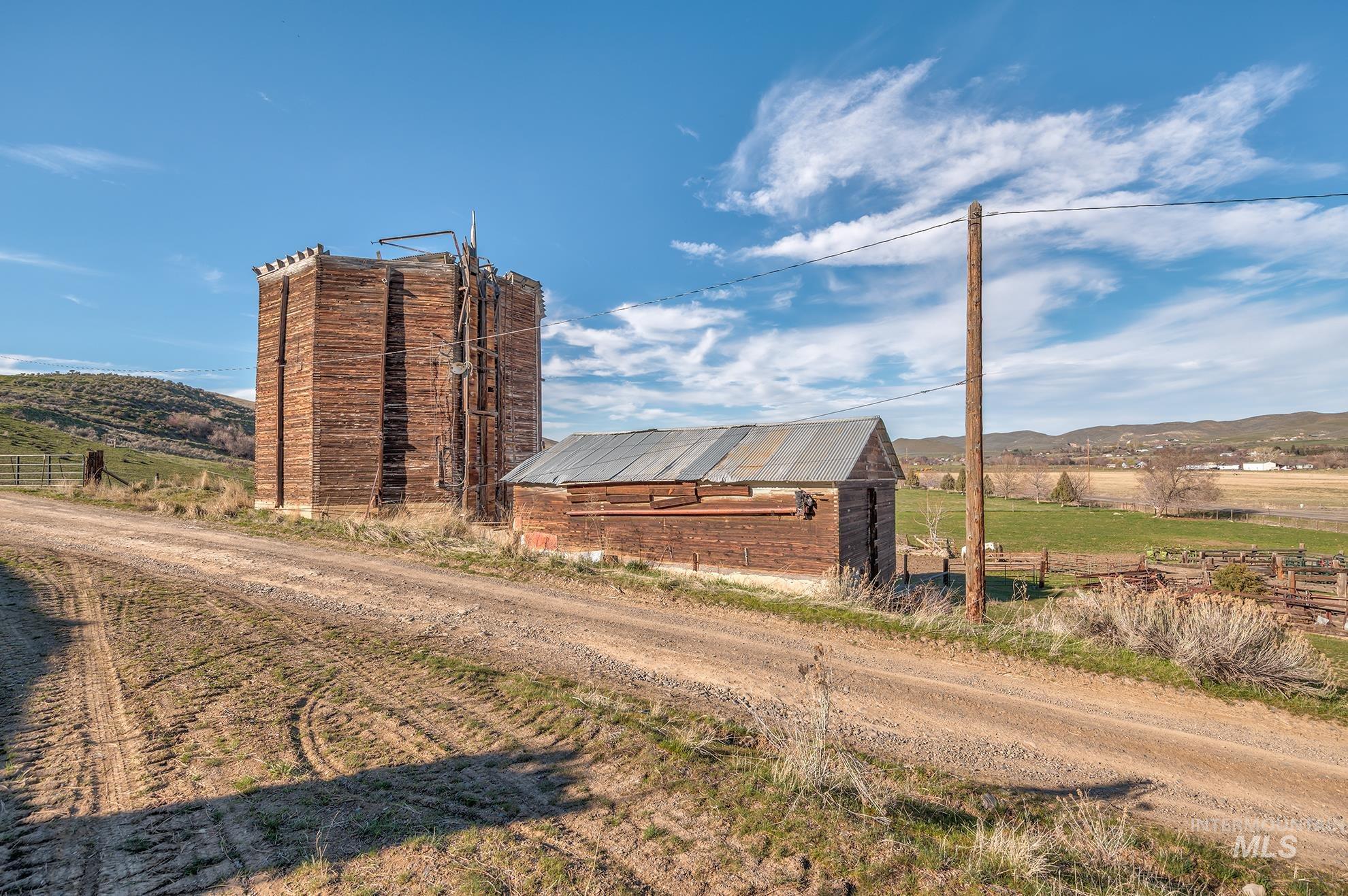 1365 Highway 95 Weiser, ID 83672 - Photo 27 of 34 View of barn with a rural view and a mountain view