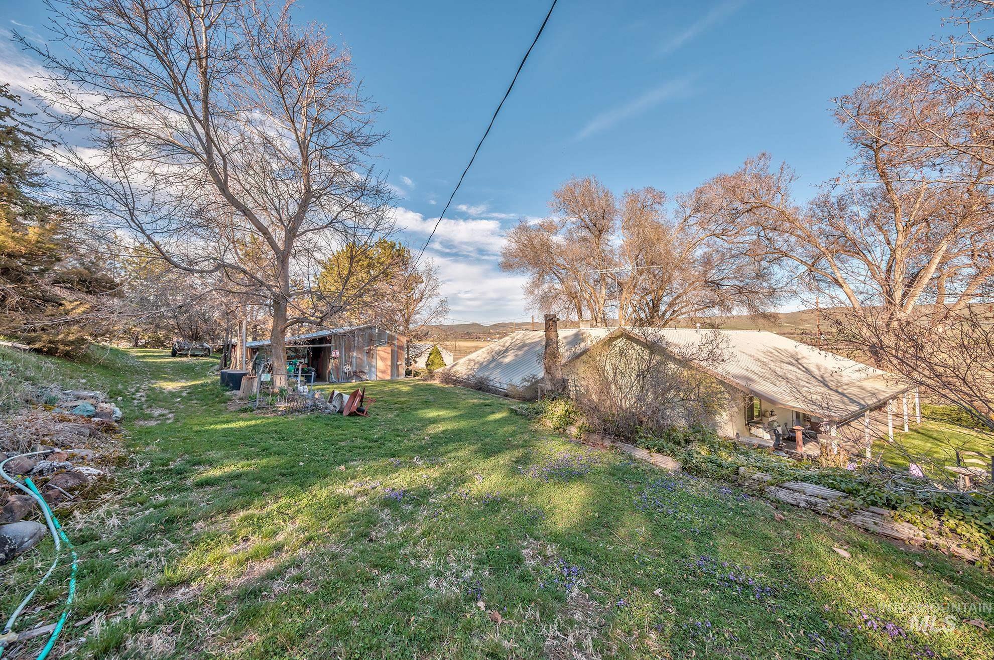 1365 Highway 95 Weiser, ID 83672 - Photo 33 of 34 View of grassy yard with a patio