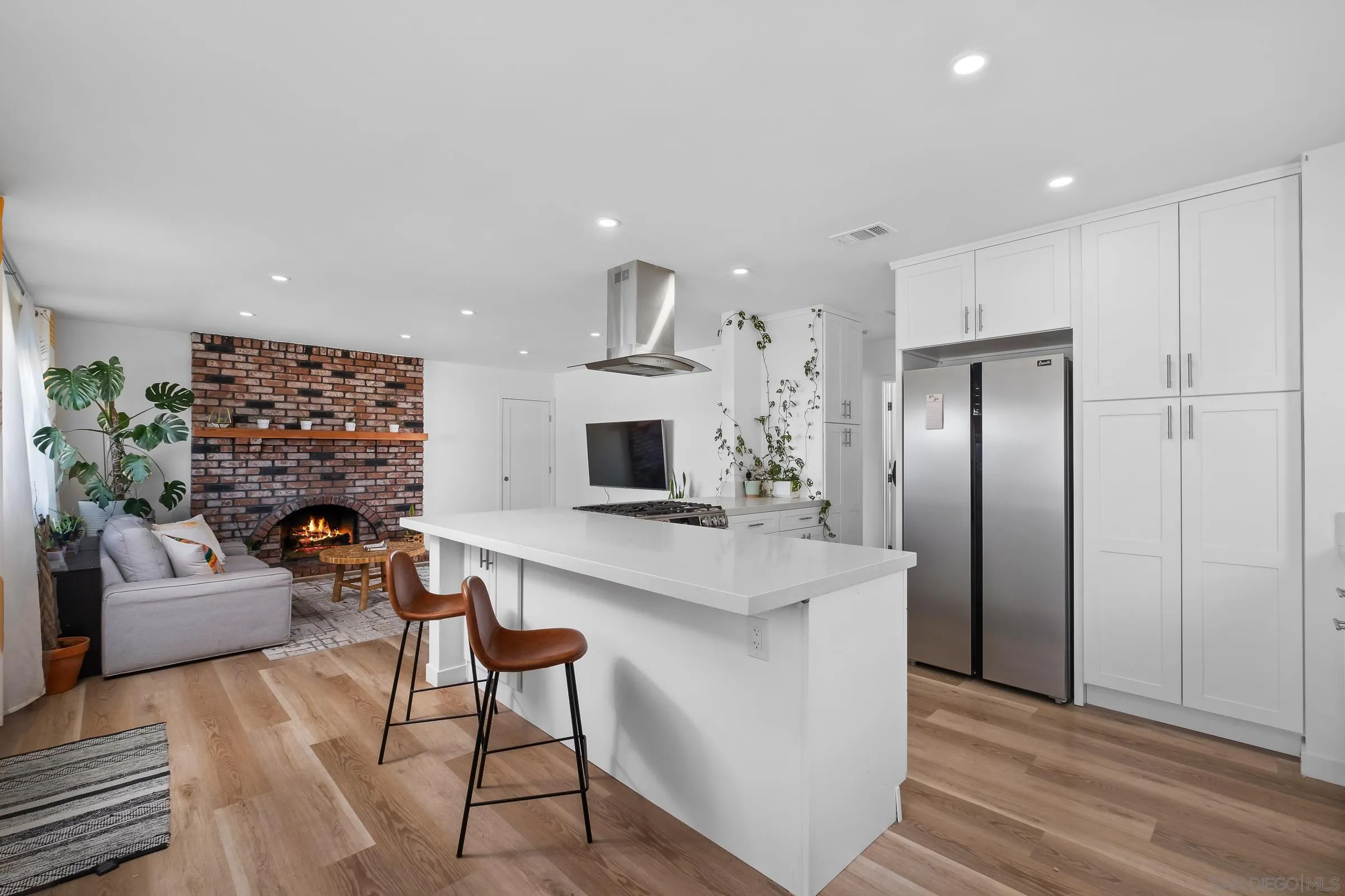 9651 Maccool Lane Santee, CA 92071 - Photo 11 of 32 a living room with furniture and a fireplace