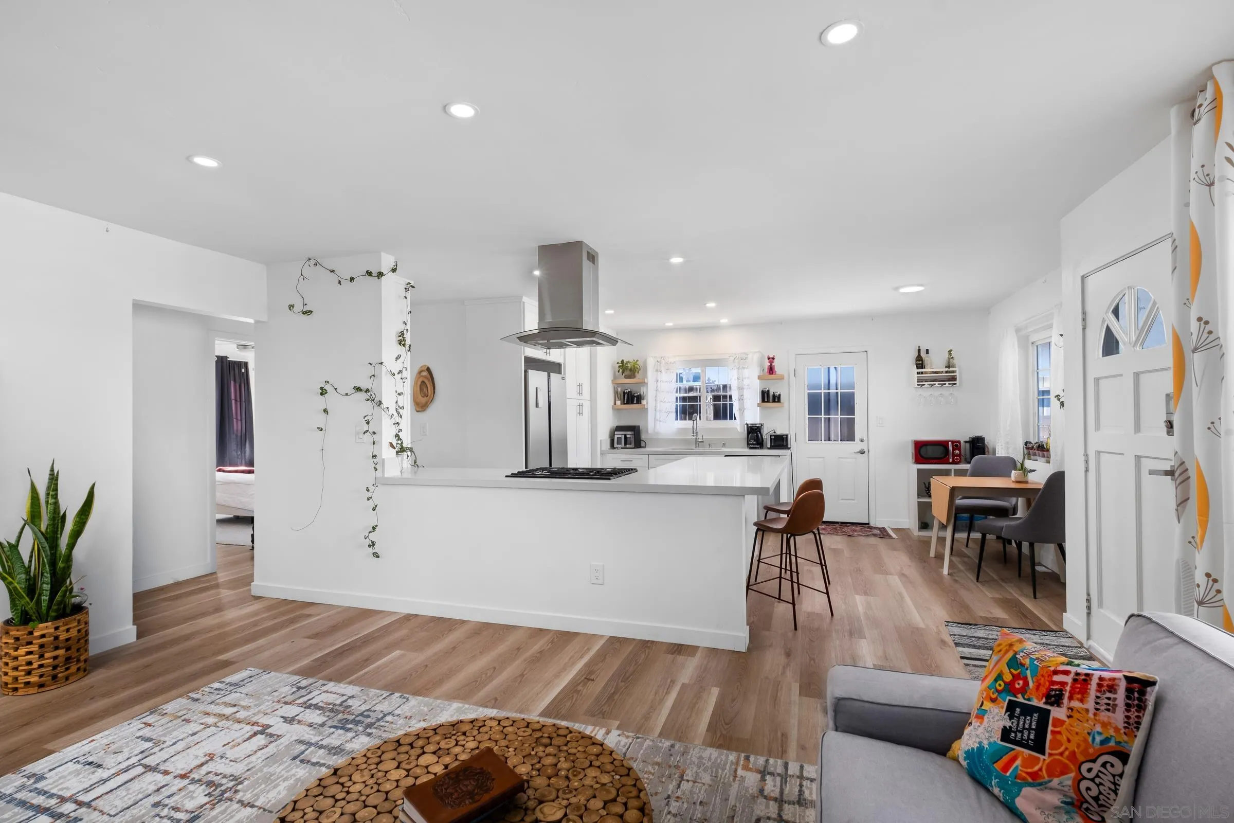 9651 Maccool Lane Santee, CA 92071 - Photo 19 of 32 a living room with furniture and a table